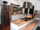 Design-Kueche Marke Haecker mit Kochinsel und Sitzessbar inkl. Geraete